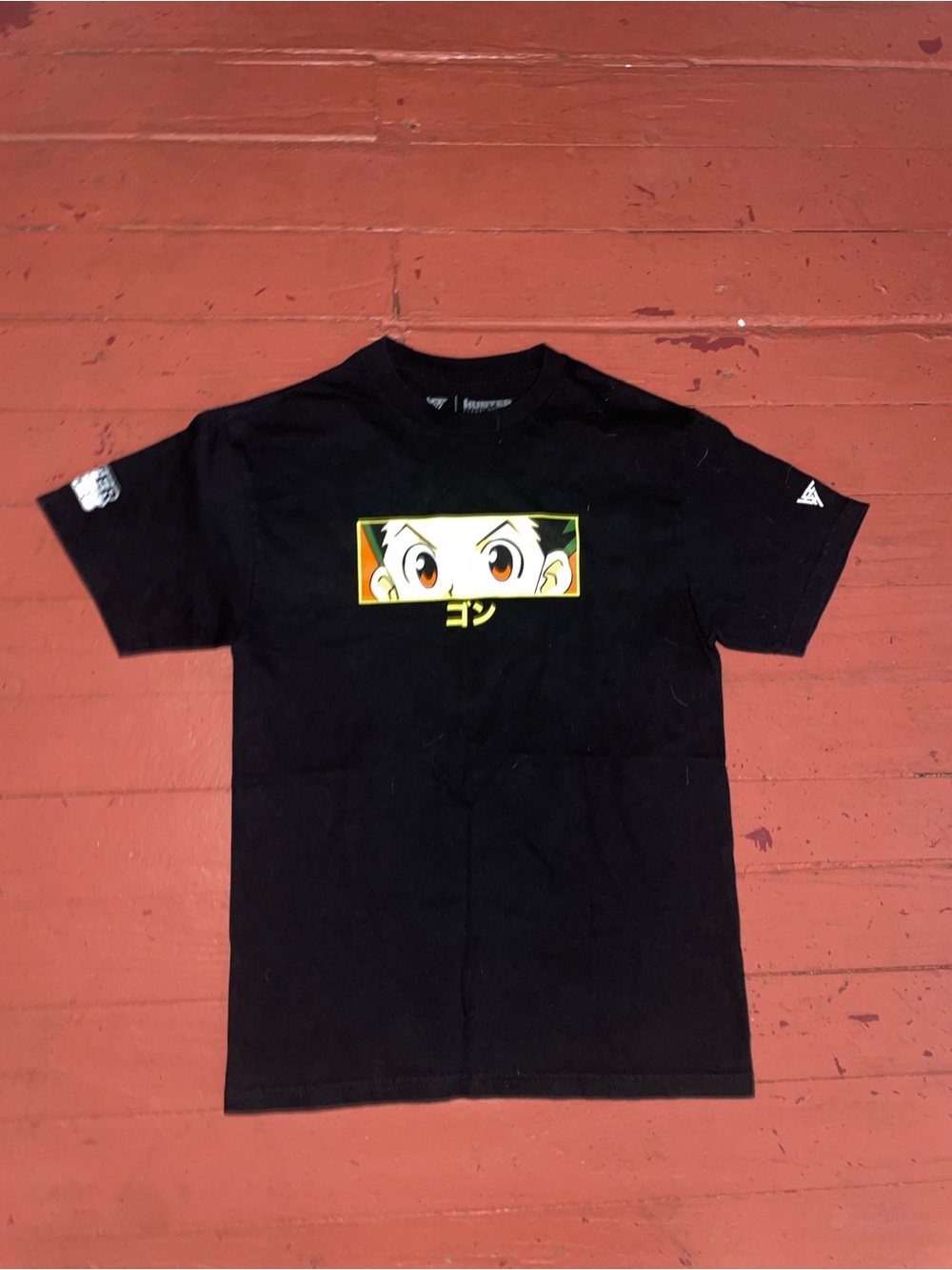Hunter Black Graphic Tee with Yellow and Green Anime Eye Accent